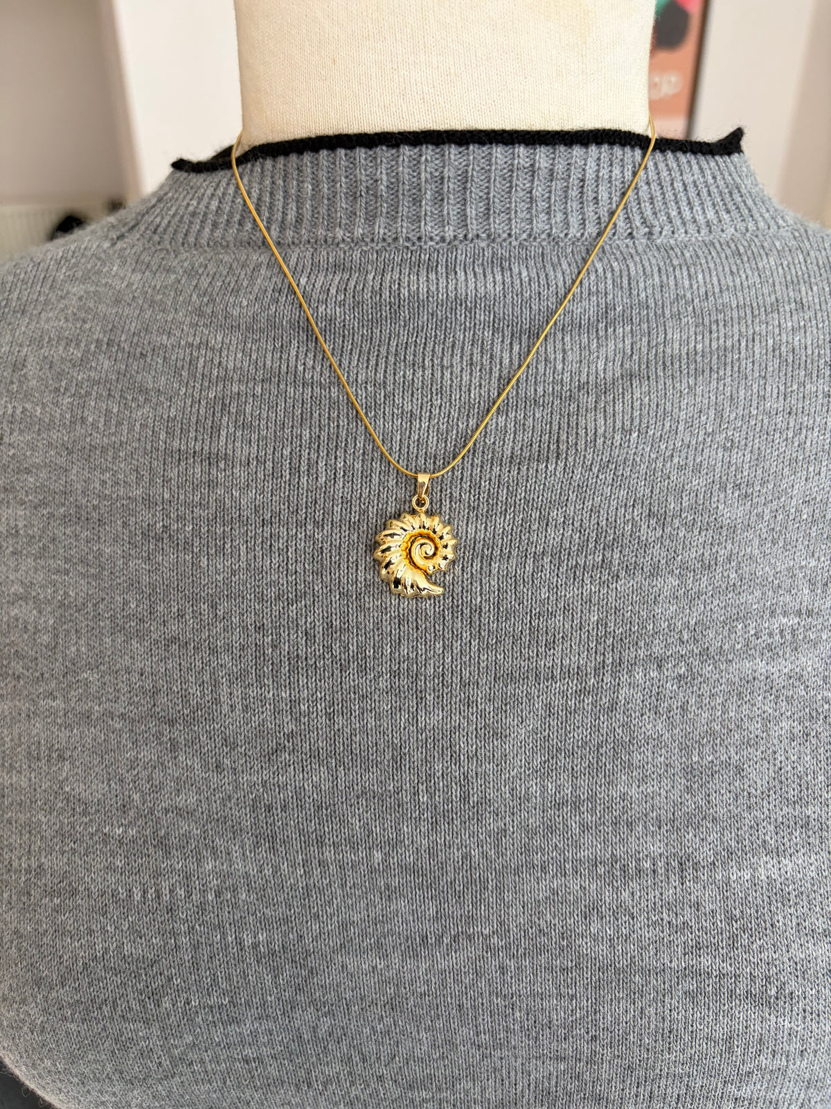 Collier coquillages doré